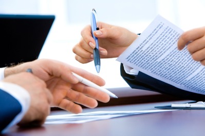 Wide laptop workspace with accounting software